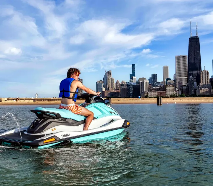 Jet ski rider with the Chicago skyline in view.